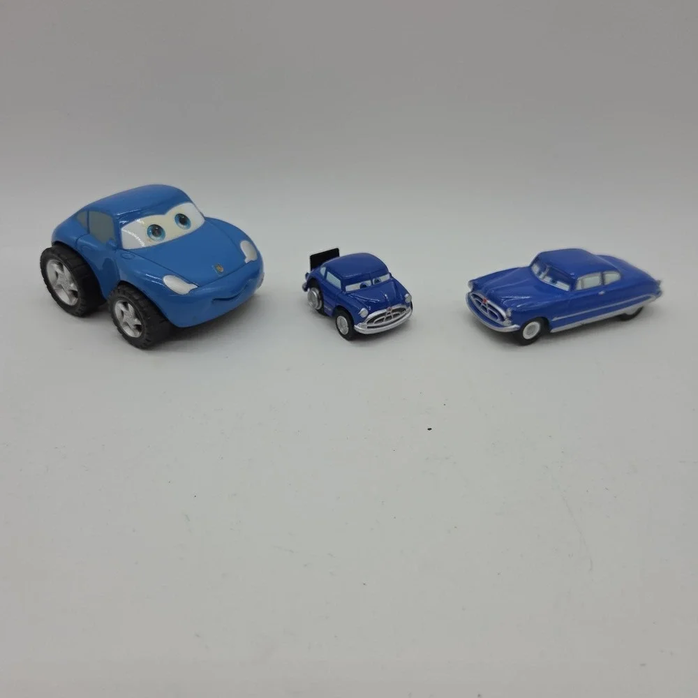 Lot 13 Disney Pixar Cars Toys Mater Hudson Chick Hicks Luigi Piston Trophy